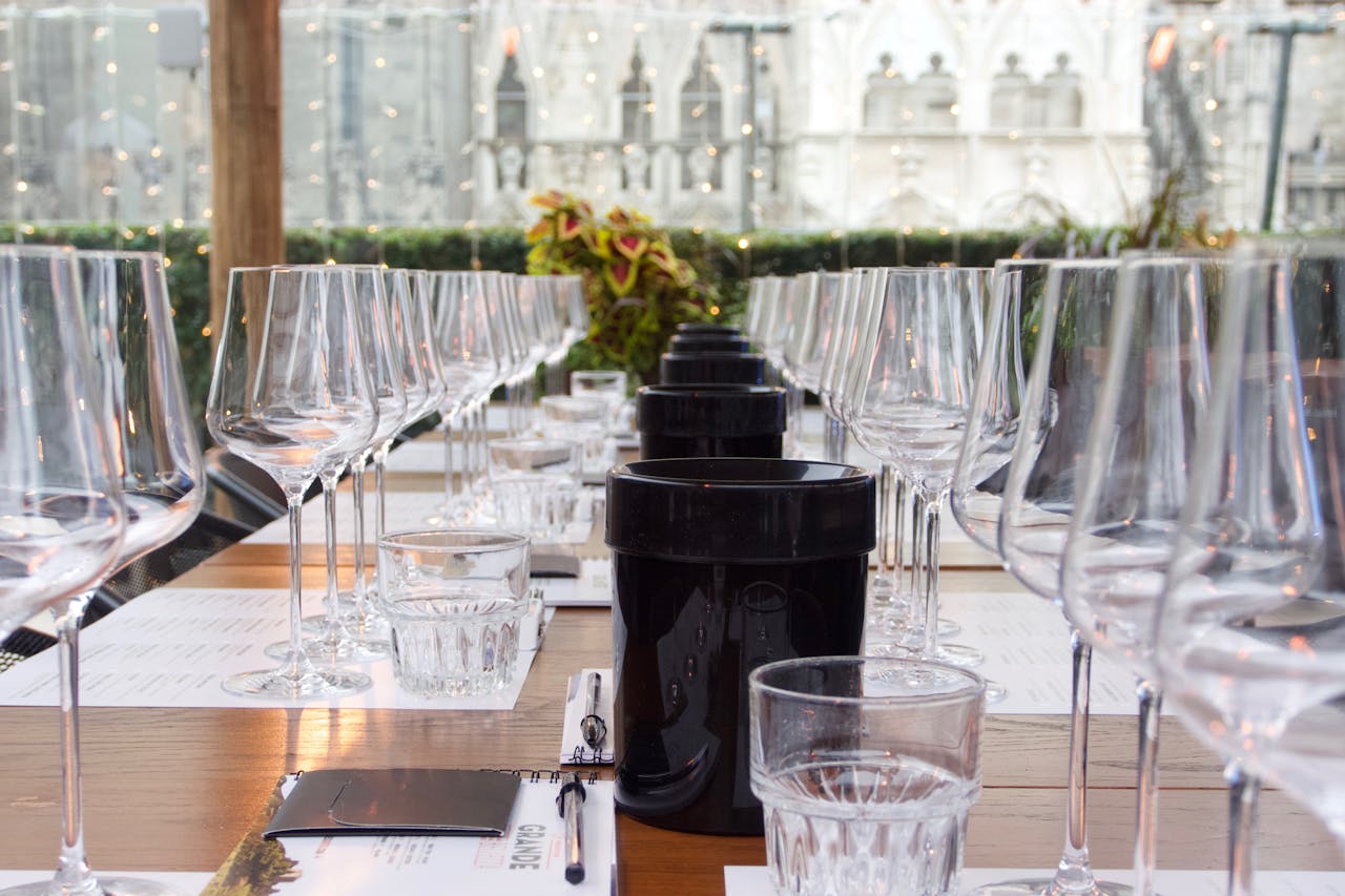 Sophisticated wine tasting arrangement with glassware in Milano, Italy.